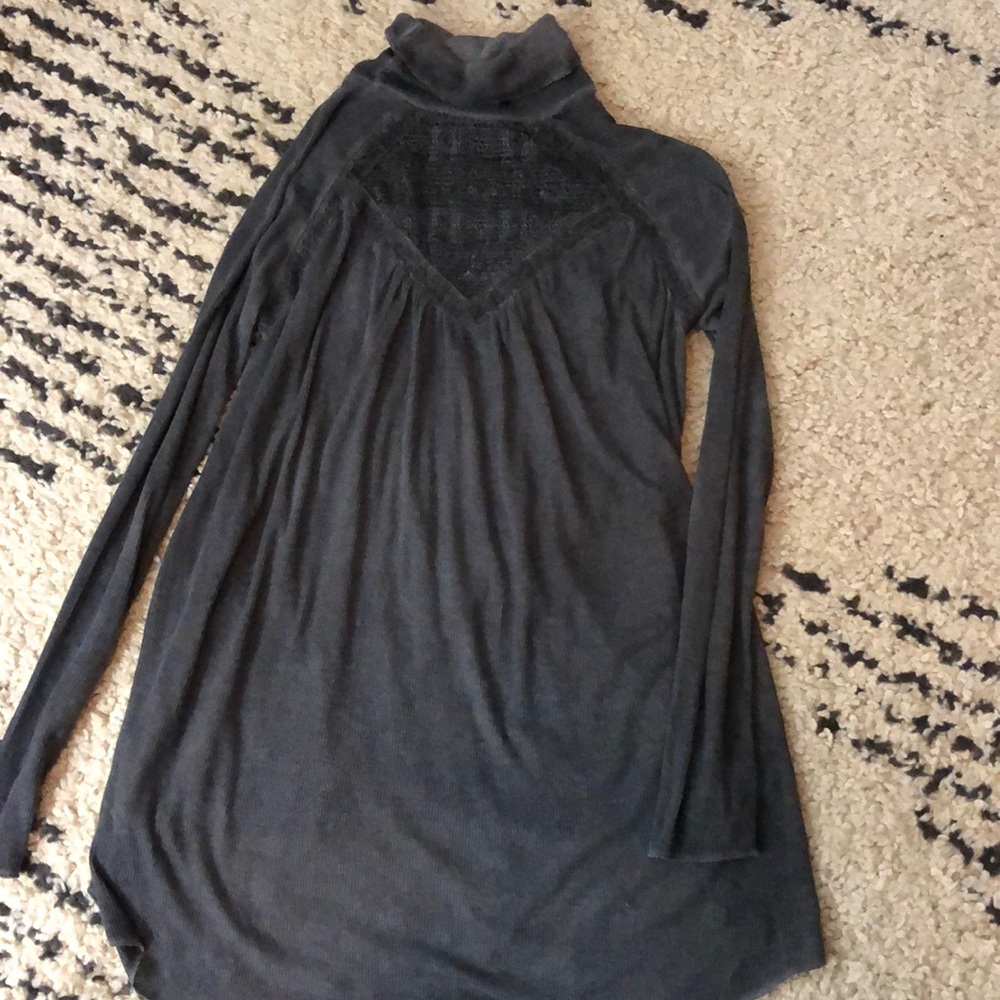 Dark gray turtleneck tunic with lace cutouts